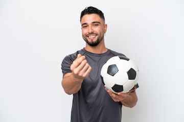Arab young football player man isolated on white background making money gesture - Powered by Adobe