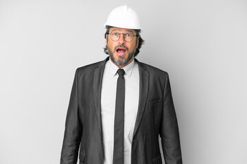 Young architect man with helmet over isolated background with surprise facial expression