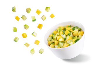 Mango avocado cucumber salad in a bowl on a white isolated background