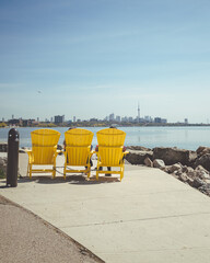 Yellow beach chairs on the beach.
