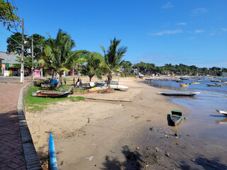 Beautiful fishing village with a river beach full of fishing boats - Praia da Caroa, Itacaré, Bahia, Brazil