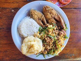 Rice with fried fish and tropeiro beans - typical Brazilian dish
