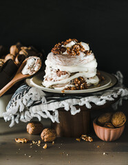 cake with chocolate summer dessert Pavlova with walnuts