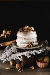 cake with chocolate summer dessert Pavlova with walnuts