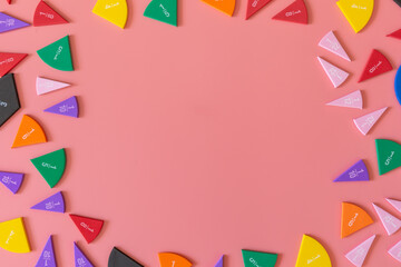 Multicolored fractions, on pink background. Interesting, fun math for kids. Education, back to school concept