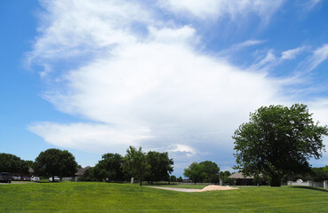 Fototapeta na wymiar Image of dissipating thunderstorm's anvil (cirrus clouds). Looking southwest from Wichita. 