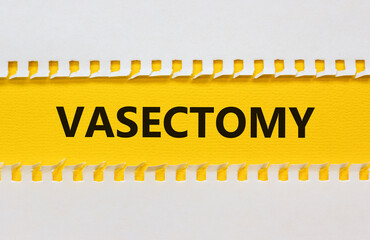 Obraz premium Vasectomy symbol. Concept words Vasectomy on yellow and white paper. Beautiful white background. Medical and vasectomy problem concept. Conceptual image. Copy space.