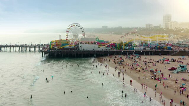 Santa Monica Pier Aerial. Aerial view of Santa Monica State Beach, Santa Monica Pier, aerial view by drone. Ferris Wheel.