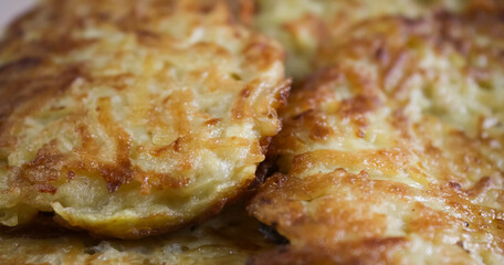 Freshly fried crispy golden potato pancake, a traditional dish