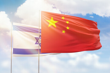 Sunny blue sky and flags of china and israel