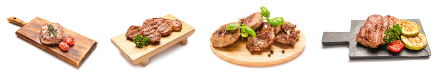 Set of tasty beef steaks isolated on white