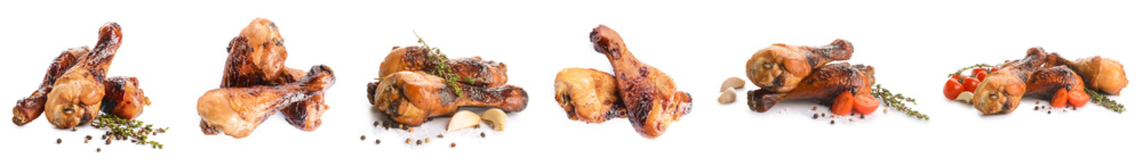 Set of roasted chicken legs isolated on white