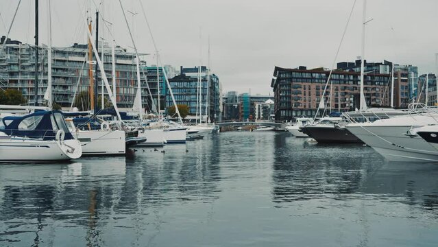 Oslo, Norway. Moored Boats And Yachts At Aker Brygge District.