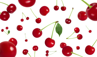 Flying cherry isolated on a white background. Falling red cherry berries. Berry fly pattern.