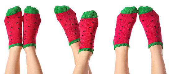 Legs of young women in socks with watermelon print on white background