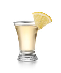 Shot of tasty mexican tequila with lemon on white background