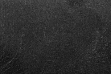 Dark grey black slate background or texture.