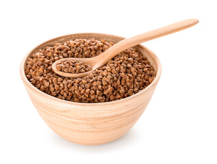 Bowl and spoon with buckwheat grains on white background