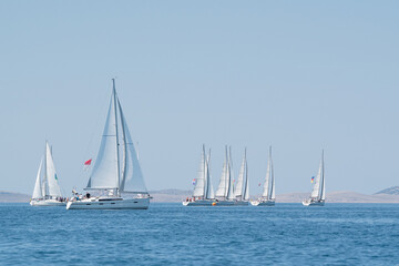 Fototapeta na wymiar Water sports, Sailing yacht group regatta race on sea near Vodice in Croatia, Adriatic sea