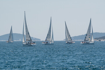 Fototapeta na wymiar Yachts compete in team sailing event, Croatia