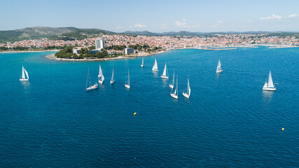 Aerial view of sailing yachts regatta race on sea near Vodice in Croatia, Adriatic sea - obrazy, fototapety, plakaty