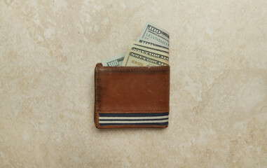 Wallet with dollar banknotes. Home budget planning. Concept of costs of living and inflation...