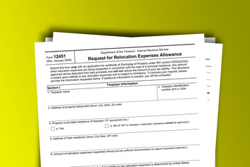 Naklejka premium Form 12451 documentation published IRS USA 07.17.2012. American tax document on colored