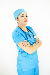 Beautiful female doctor wearing uniform and blue surgical cap,  professional woman with stethoscope on her neck on white background