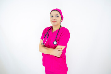 beautiful female medical assistant wearing uniform and pink surgical cap, stethoscope, professional on white background
