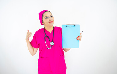 beautiful woman medical assistant, wearing uniform and pink surgical cap, stethoscope on her neck, holding clipboard with results, on white background
