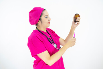 beautiful woman medical assistant wearing uniform and pink surgical cap, stethoscope, preparing injection on white background