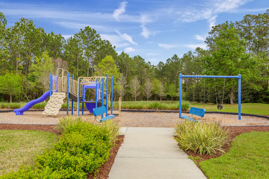 Fun outdoor playground for children with swings and slide