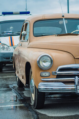 Fototapeta na wymiar Old retro cars on the city street