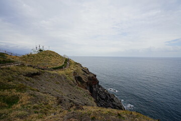 seaside cliff walkway and people
