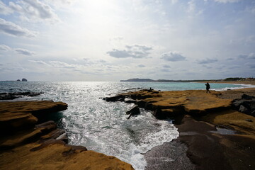 rock beach and people