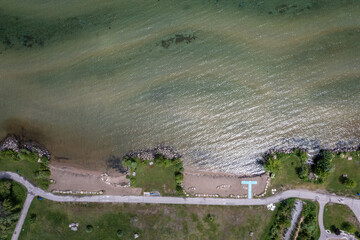 Innisfil beach views with green water patterns looking Down