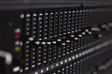 Slide and knob to adjust the sound frequency equalizer.