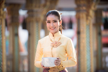 Portrait cheerful young asian woman with Songkran festival, Thailand. Thai New Year's Day. Thailand traditional.Family Day in April