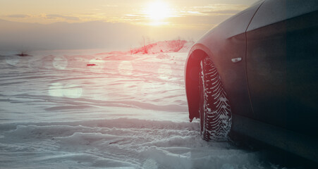 car and cold winter road