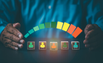 The young businessman puts his hands between the sticks on the table.