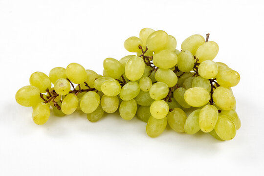 Fresh green organic bunch of grapes isolated on white background