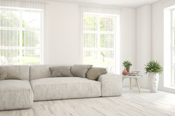 Modern living room in white color with sofa. Scandinavian interior design. 3D illustration
