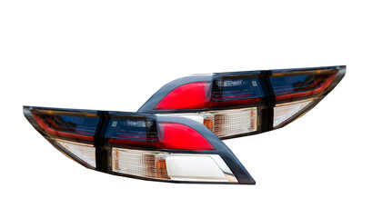 Car tail lights separate from white background.