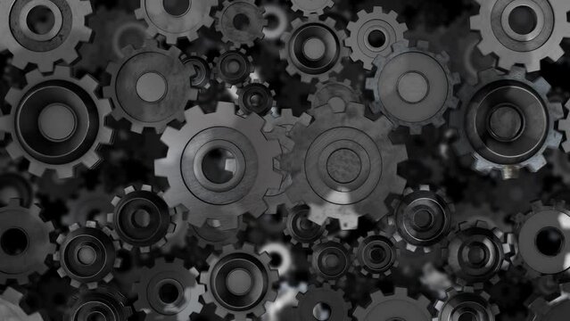 Black and white animated gears background, starts turning slowly then speeds up fast.