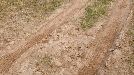 Wheel track on dunes background