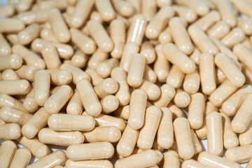 Vitamin pill, herb capsule, Nutritional Supplement.	
