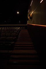 dark chairs in a row in the cinema, slight blurring of the image