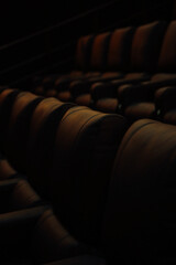 Naklejka na ściany i meble dark chairs in a row in the cinema, slight blurring of the image