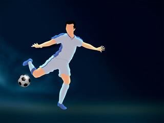 Faceless Footballer Player Kicking Ball On Blue Background And Copy Space.