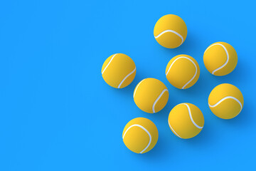 Strewn orange tennis balls on blue background. International championship. Sports equipment. Active sport. Game for leisure. Flat lay. Copy space. 3d render